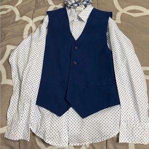 Boys suit. Size 8. Vest, elastic pants, long sleeve shirt and elastic bow tie